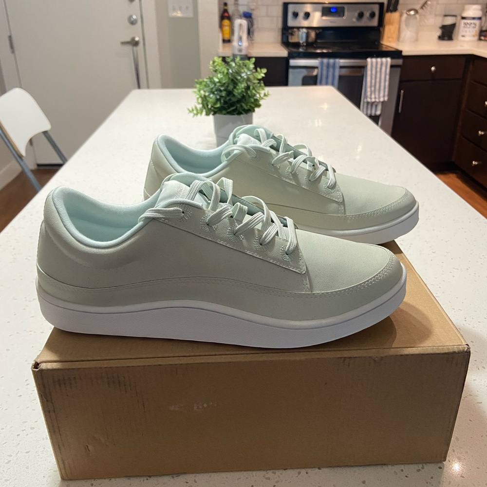 This is a brand new pair of Plant Pacer sneakers from AllBirds in Dreamy Green